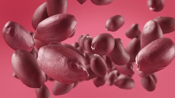 Flying of Peanuts in Light Fuchsia Background alt