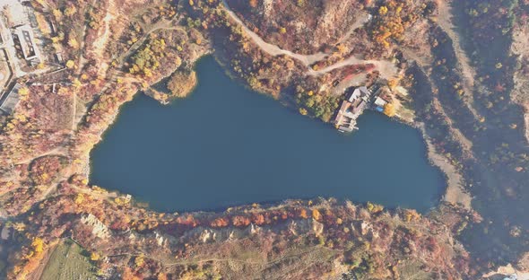 View of the Artificial Lake in a Flooded Part of a Granite Quarry Lined with Stone alt
