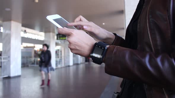 Modern Woman Using Tablet At Airport Terminal alt