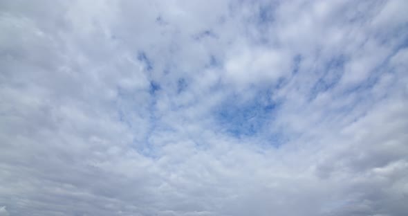 Clouds On Blue Timelapse Background alt
