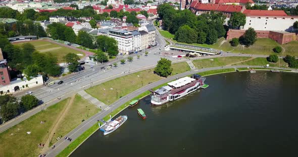 Aerial View of Vistula River and Tourist Boats near Wawel Castle. Krakow, Poland.