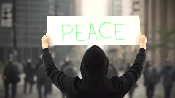 PEACE Text on a Protest Banner alt