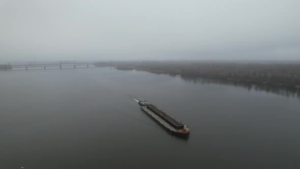 The Barge Floats on the River