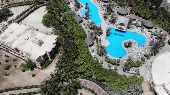 Aerial footage of the Hotel in Cabo Verde Cape Verde showing the swimming pools and building