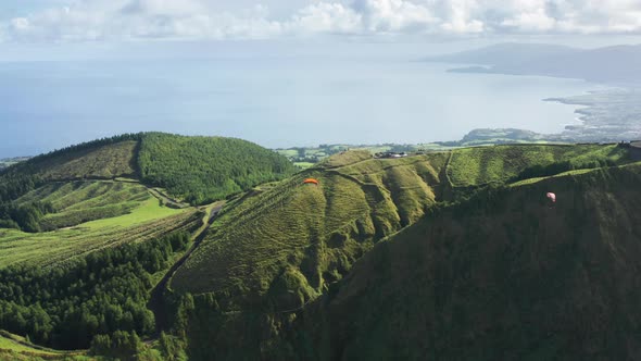 Parachutists Flying in Sky Over Landscape of Miradouro Do Cerrado Das Freiras alt