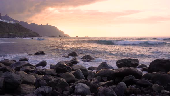 Ocean Waves Crash on Rocks in Sunset Light Playa Benijo Beach Tenerife Canary