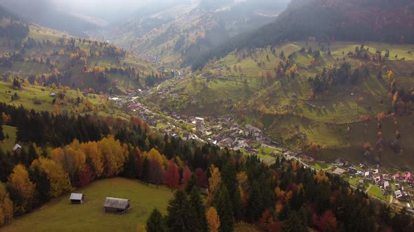 Aerial View of Forest and Resort During Autumn at Sunset