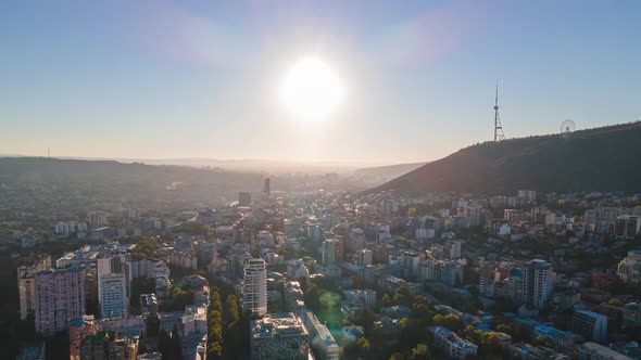 Aerial hyperlapse of beautiful cityscape of Tbilisi at sunrise, Georgia 2021 alt