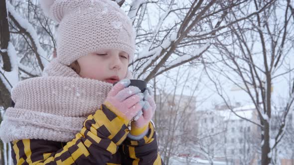 Child with Thermos in Winter alt