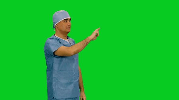 Doctor In Uniform Doing Different Gestures Through Virtual Display