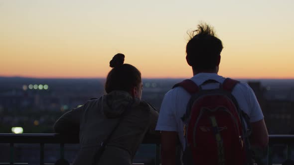 Couple admiring the view from Mount Royal alt