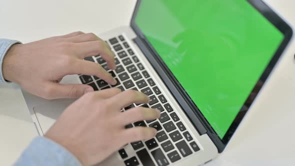 Close Up of Typing on Laptop Chroma Key Screen alt