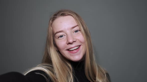 The Girl Communicates Via Video Link with Her Loved Ones alt