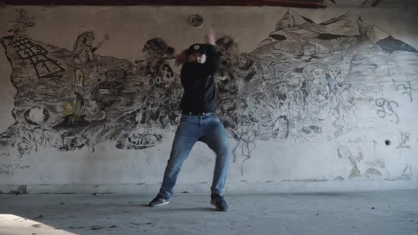 Modern dance in an old building - graffiti background alt