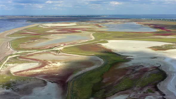 Beautiful flight in summer over salt lakes. Dry lakes. Green grass. alt