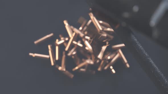 Minigun firing to the invisible target. Deadly firearm rapidly shooting bullets. alt