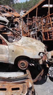 Vertical Video of Destroyed Cars in the City of Irpin Ukraine alt