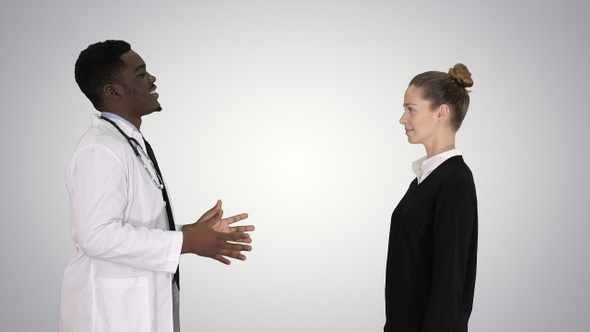 Doctor Telling Good News and Patient Leaves on Gradient Background alt