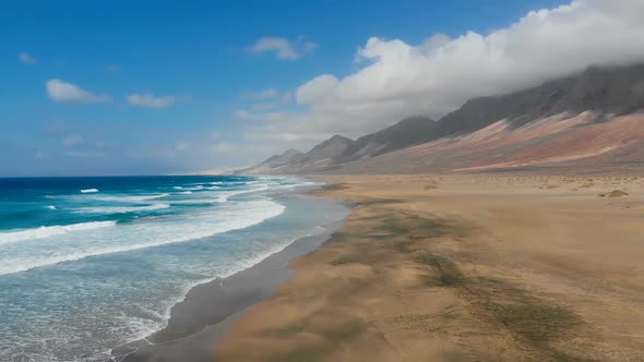 Drone flying over  Beautiful Cofete Beach In Canary Islands alt