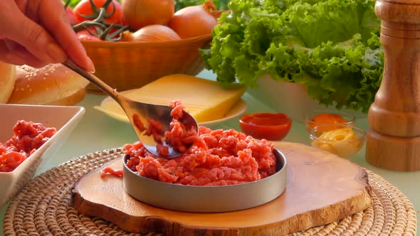 Rapid Shoot of Minced Meat Pressed Into a Cutlet alt