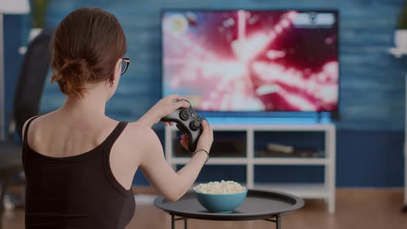 Closeup of Gamer Girl Holding Wireless Gamepad Disappointed Because Losing Online First Person alt