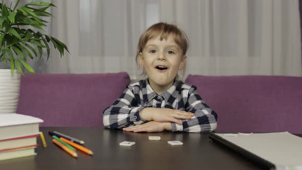 Children Making Video Call Doing Distance Education Lessons at Home. Webcam View alt