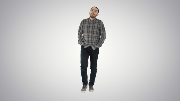 Young Man Walking With Hands In His Pockets And Whistles, Stock Footage