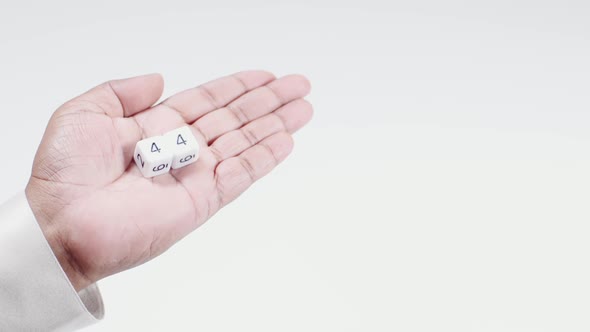 Hand Holds Numbered Dice   Four And Four Forty Four  alt