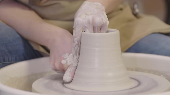 Artisan Making Jar on Potter Wheel alt