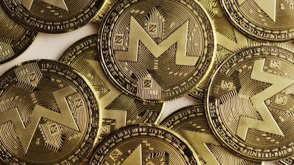 Rotating shot of Bitcoins  alt