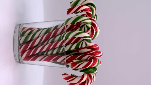 Vertical orientation video: Christmas candy cane caramels