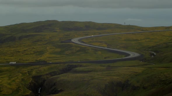 beautiful iceland landscape during sunset, ring road 1, the main higway with passing cars can be see alt