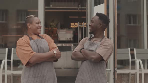 Waiters Posing Outside Cafe alt
