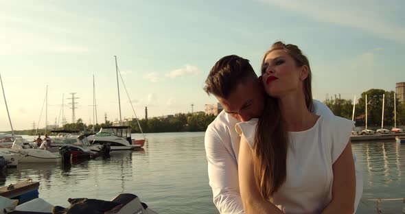 Couple Standing in Port in Summer