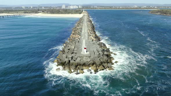 A feat of man made construction , the Gold Coast  Seawall , Queensland Australia in Slow Motion alt
