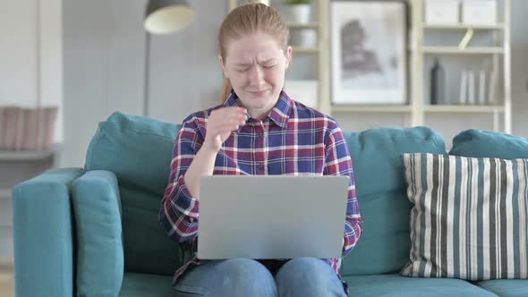 Young Woman Working on Laptop And Having Headache alt