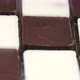 Dark and White Chocolate in a Box on Gray Background - VideoHive Item for Sale