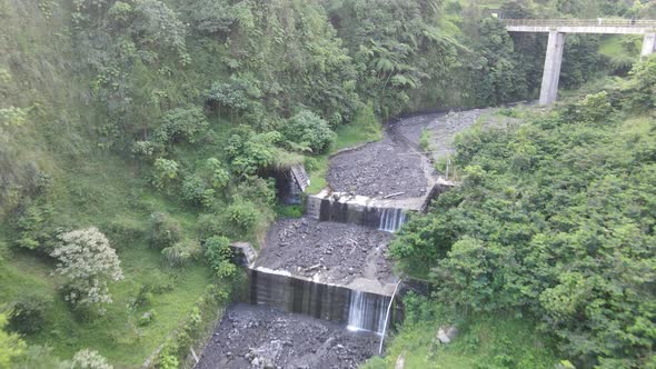Aerial view of Valley with small river in Pluyon Merapi Mount, Indonesia. alt
