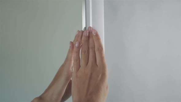 Bathroom Interior Woman Touch Mirror New Furniture Close Up alt