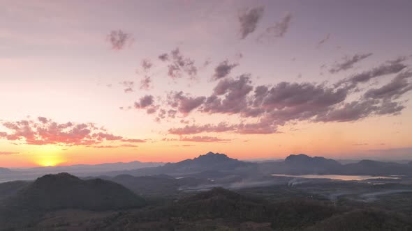 Forests and mountains at evening and smoke from forest fires. alt