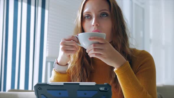 Portrait Close Up of Happy Pretty Young Woman, Girl Sitting in a Cafe Working on a Laptop alt
