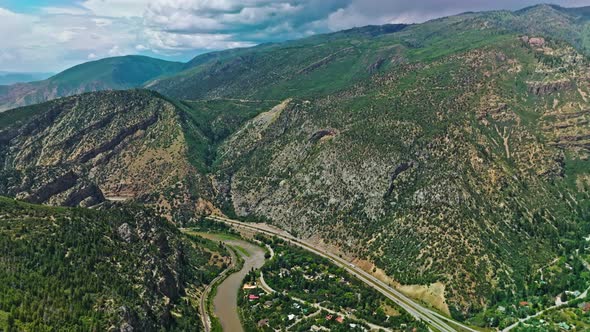 Intensity Highway Road Passing in Colorado River in Canyon alt