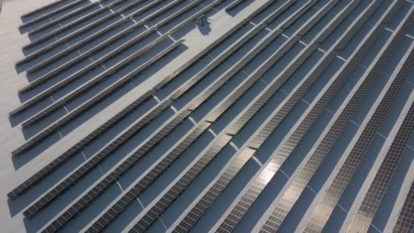 Solar Panels Power Station in Desert at Winter Morning Aerial View