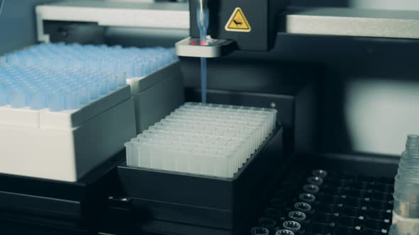 Automated Machine Is Testing Biochemical Liquids alt