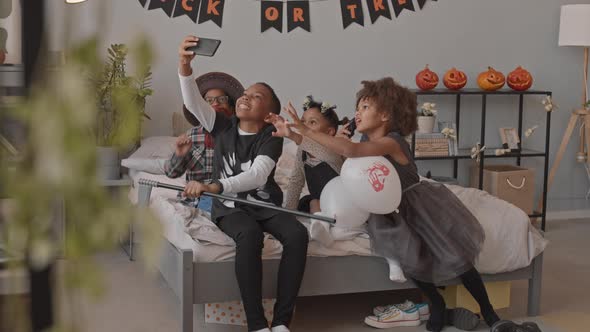 African American Kids Celebrating Halloween alt