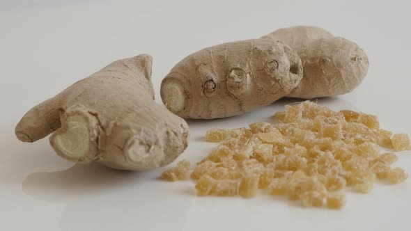 Pile of crystallized cubes of Zingiber officinale slow tilt 4K 2160p 30fps UltraHD footage - Fresh a alt