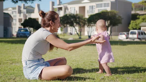 Beautiful Baby Girl Stand Up with Mother Support alt