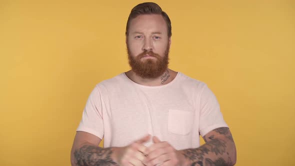 Man showing fist gesture, beating hand.