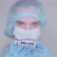 The doctor holds the vaccine in his hand in an ampoule - VideoHive Item for Sale