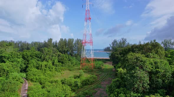 Aerial view high voltage steel power pylons Transmission tower supporting high voltage power line alt
